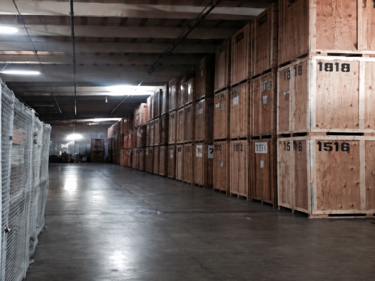Rows of numbered wooden storage vaults in the Shamrock warehouse